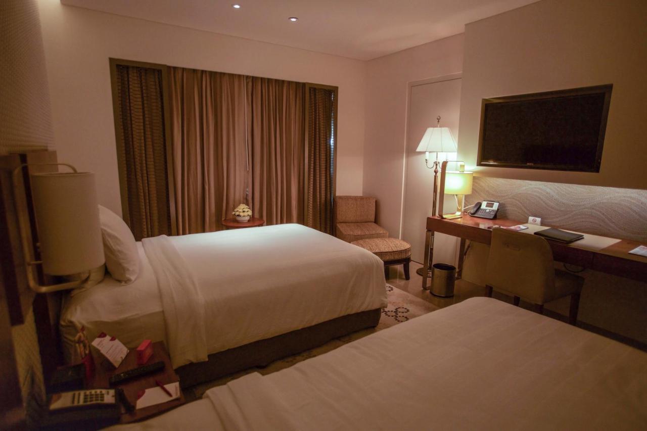 فندق كراون بلازا شيناي أديار بارك المظهر الخارجي الصورة A room at the hotel