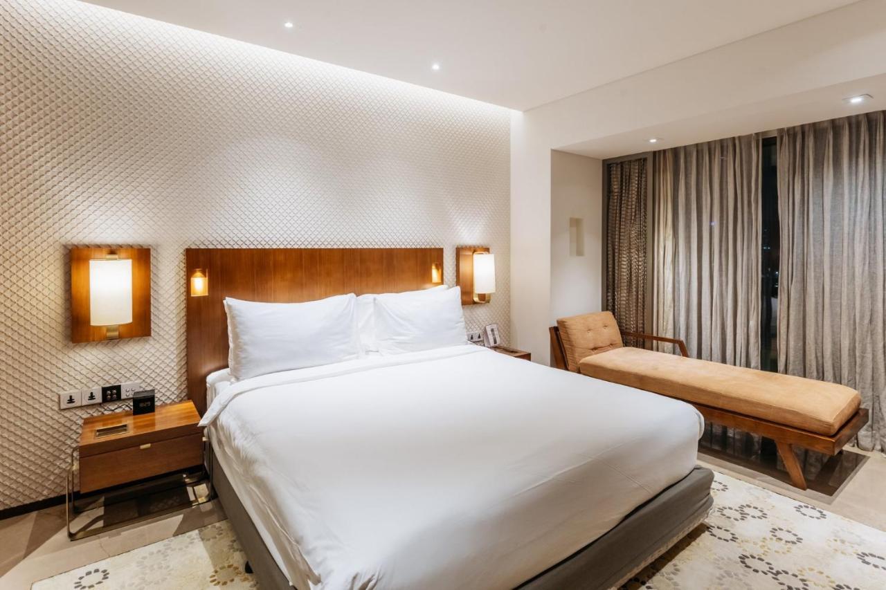 فندق كراون بلازا شيناي أديار بارك المظهر الخارجي الصورة A bedroom at the Taj Bengal